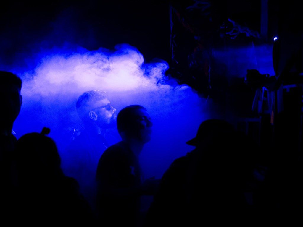 Club night with room-tuned sound system and atmospheric lighting