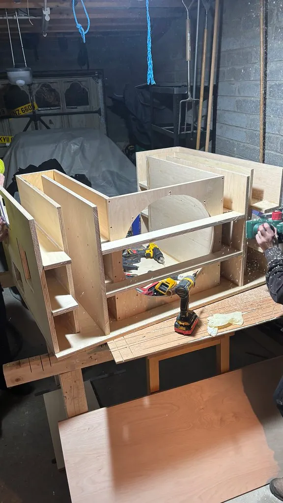 Subwoofer cabinet mid-build in the Primal Effect workshop